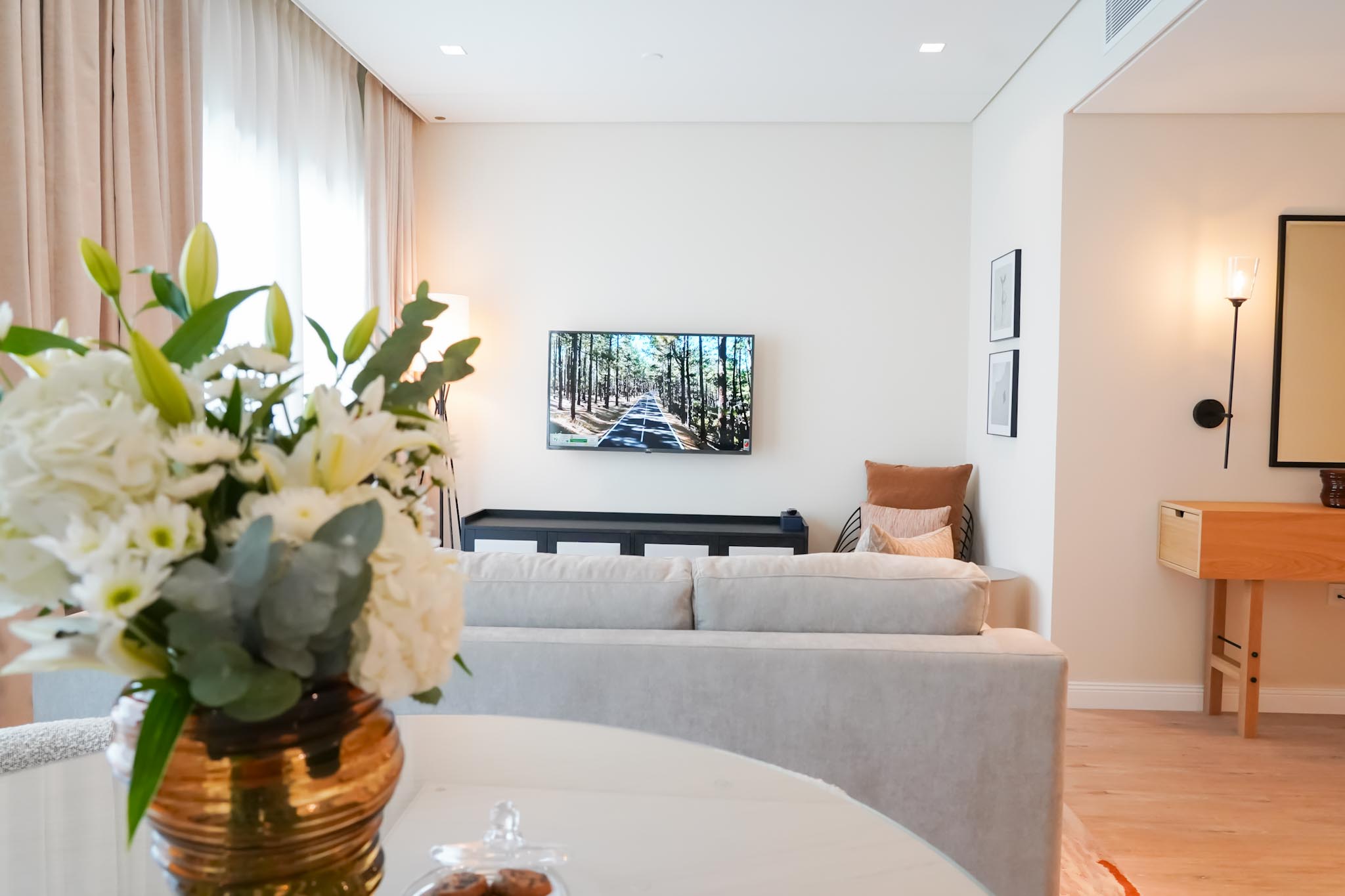TV in a Livingroom in Andalus By Al Seef Resort and Spa