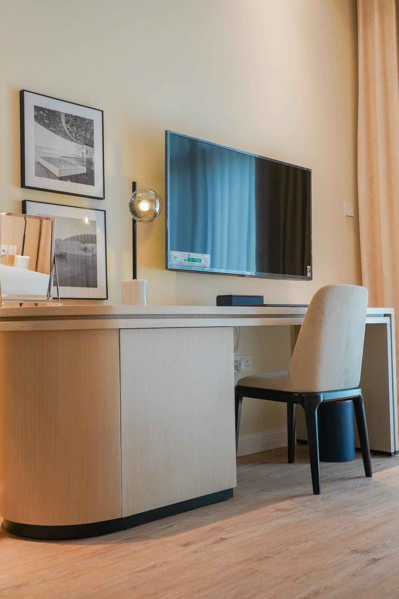TV and Arm Chair in Andalus By Al Seef Resort and Spa