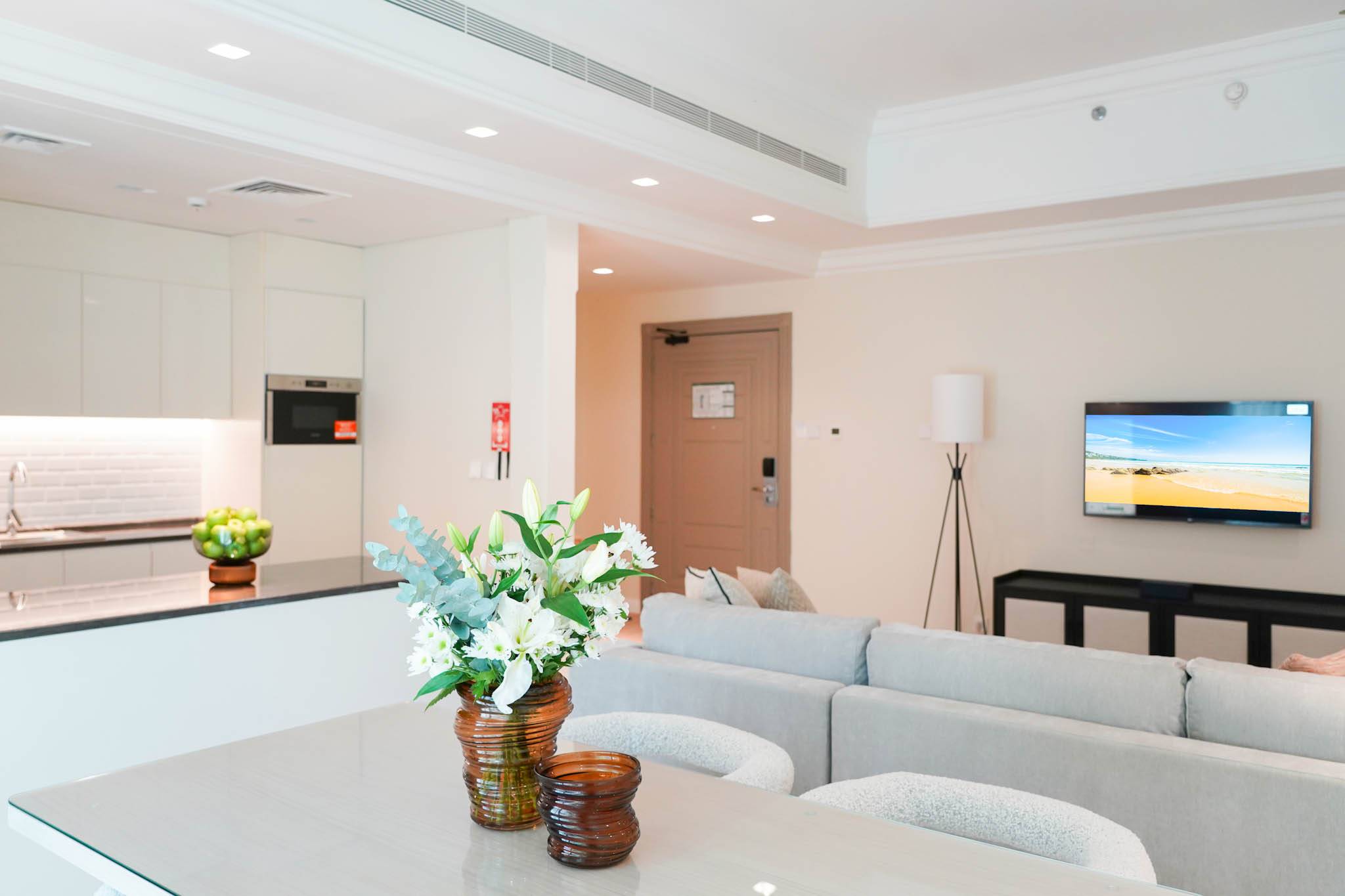 Living Room with a TV in Andalus By Al Seef Resort and Spa