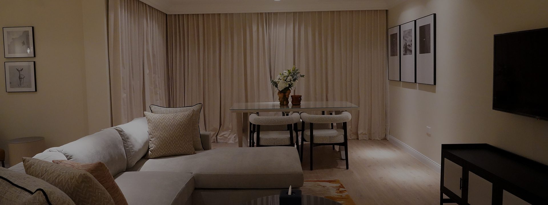 Spacious suite living and dining area at Andalus Al Seef Resort and Spa