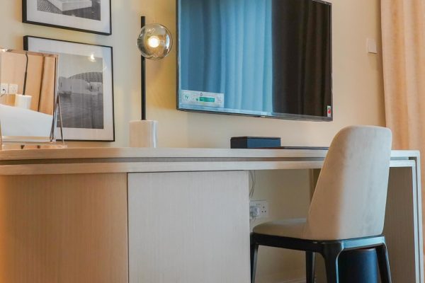 TV and Arm Chair in Al Seef Resort and Spa
